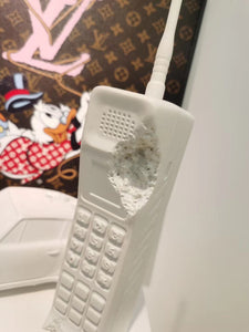 ERODED MOBILE PHONE RELIC