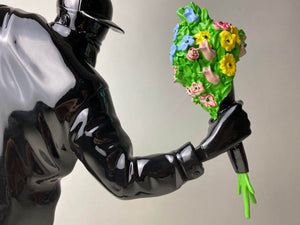 FLOWER BOMBER FIGURINE