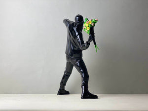 FLOWER BOMBER FIGURINE