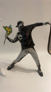 FLOWER BOMBER FIGURINE
